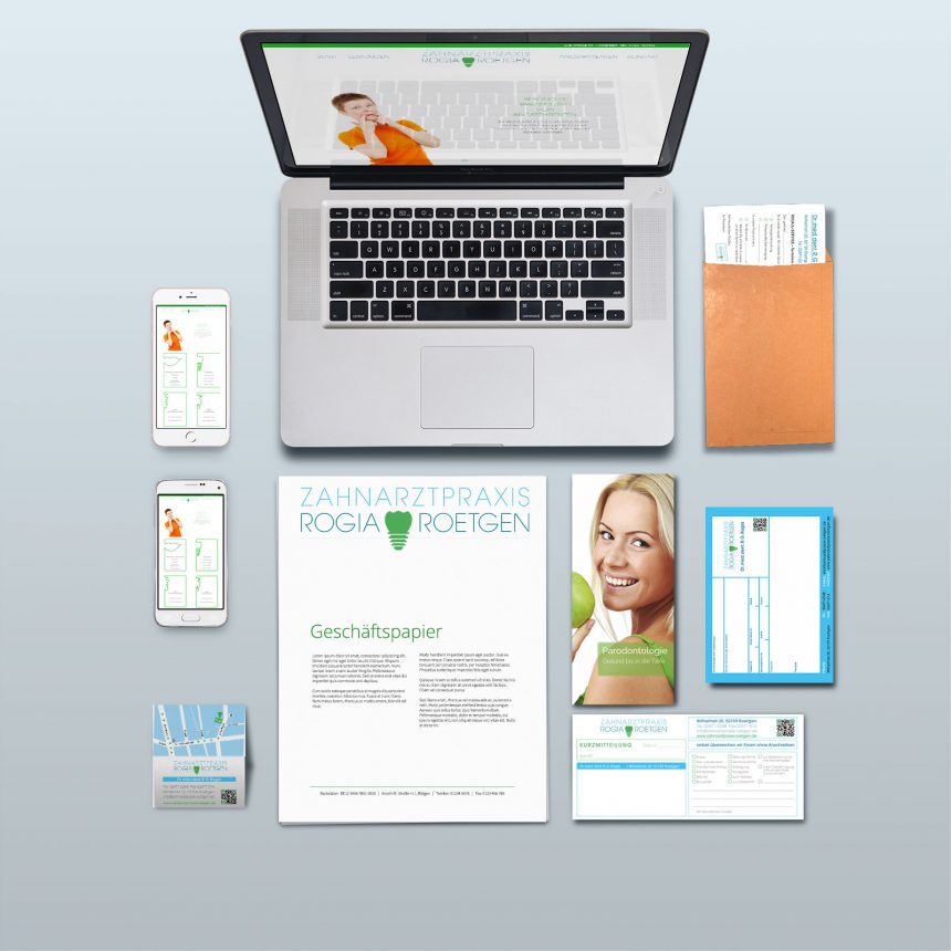 O-ZEN Design Portfolio Zahnarztpraxis Roetgen Corporate Identity dargestellt durch Laptop und Drucksachen